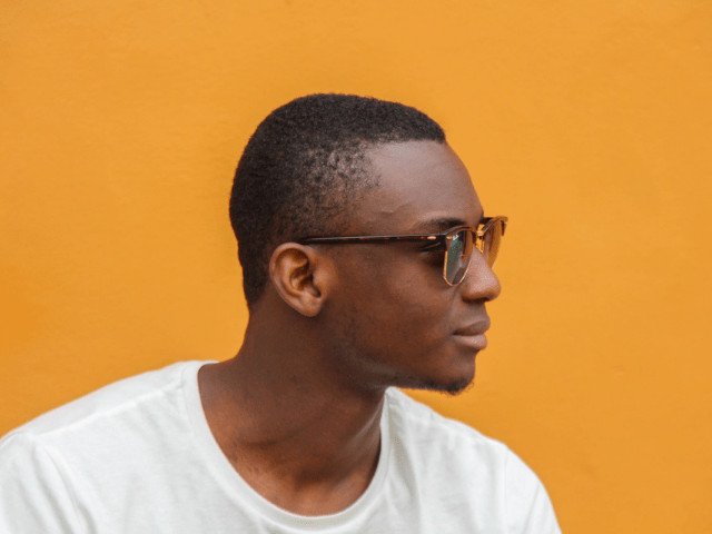 black man looking at right