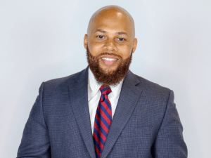 Bald man wearing a suit