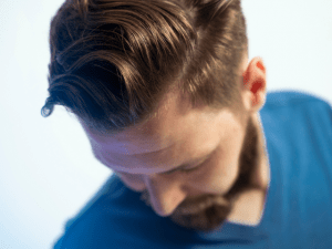 man wearing blue shirt