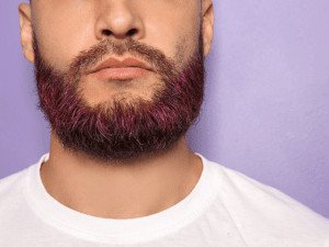 man with colored beard wearing white shirt