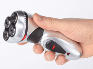 hand holding an electric shaver