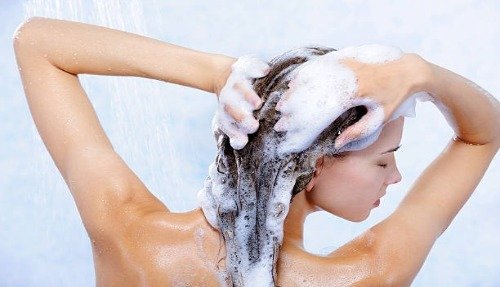woman shampooing